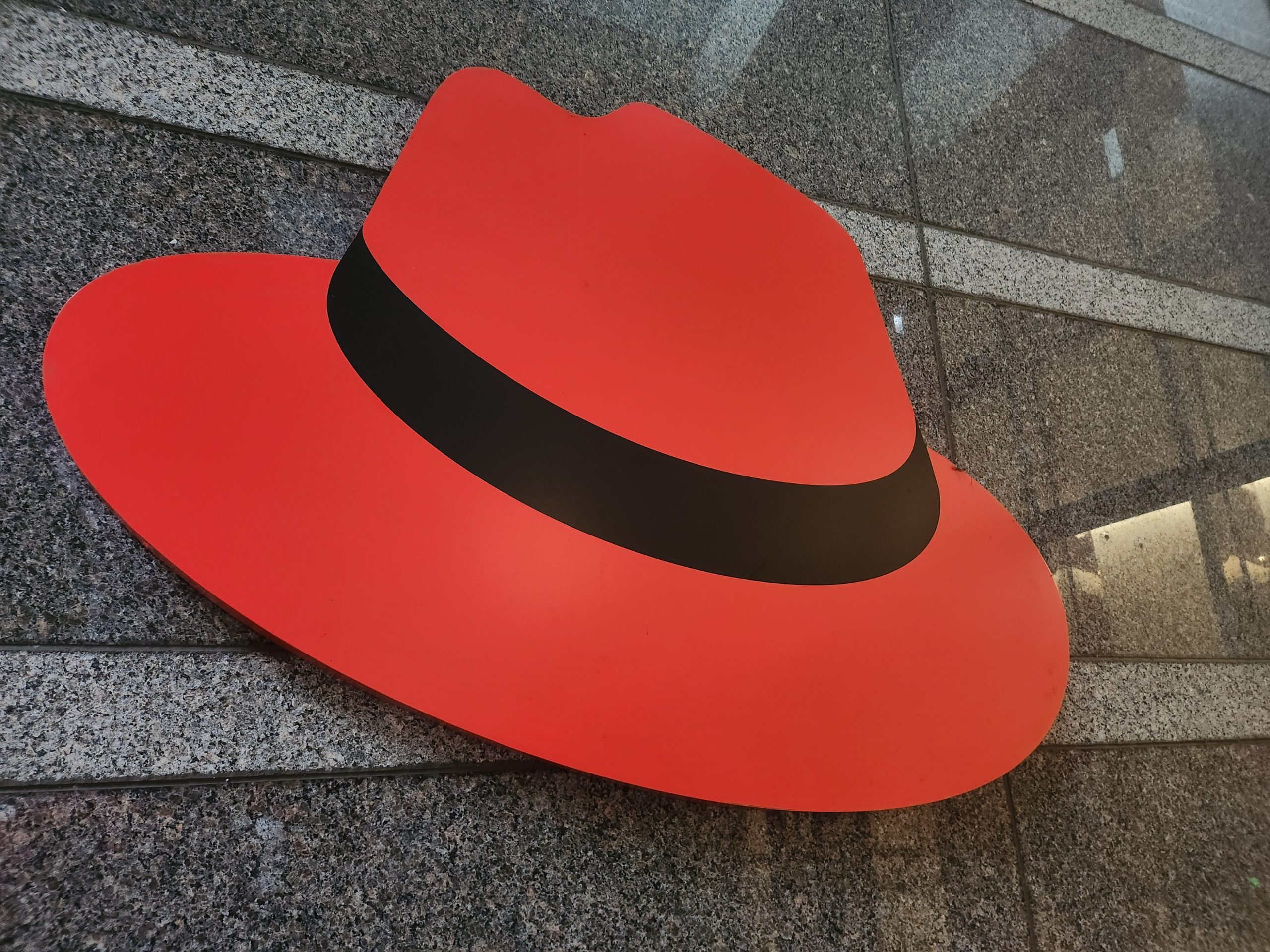 Photo of the Red Hat Fedora sign from Red Hat Tower in Raleigh, NC